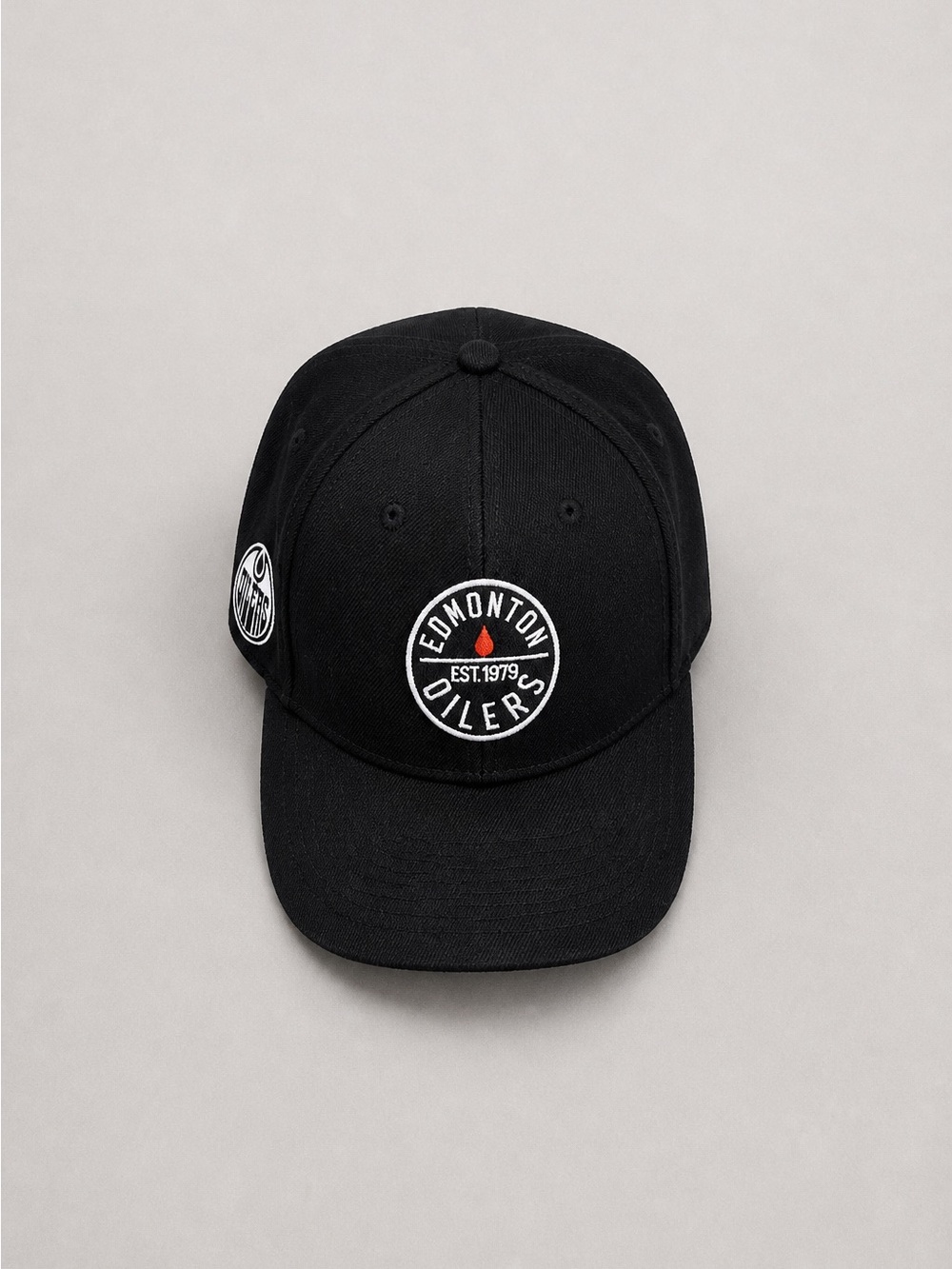 American Needle Black Edmonton Oilers Logo Cap with Orange Detail